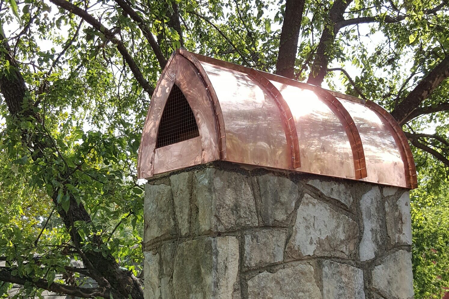 Custom copper chimney cap fabricated by DFW Chimney Specialist