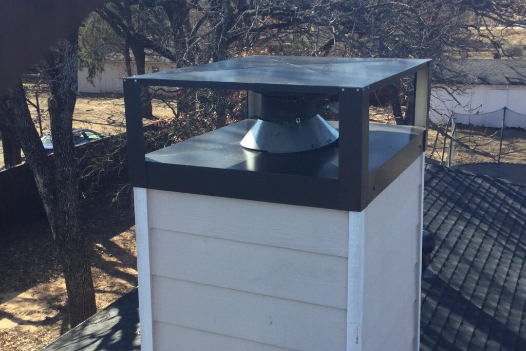 T-Top cap providing extra water protection for a metal flue